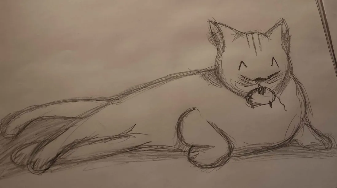 A cat holding a mouse in it's mouth